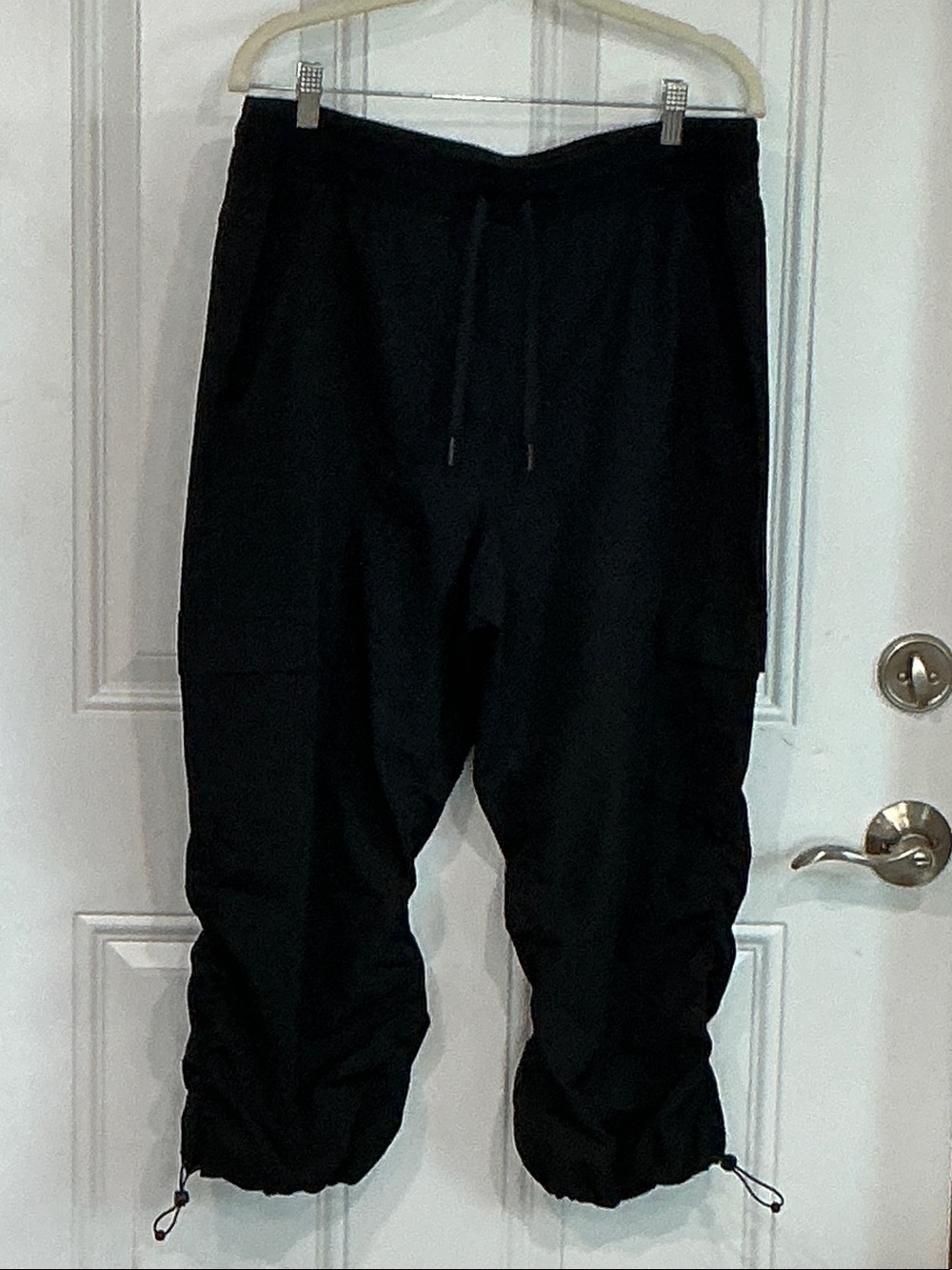 Exercise pants in black parachute like material.  Size	L  comfy fun